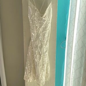 Gorgeous off white mini dress with bead detail and a lace up back. NWT XS